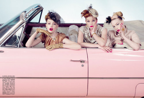 Women in a pink car